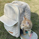 White cat backpack carrier, pet travel carrier, breathable cat backpack, stylish cat carrier, cat supplies Australia, durable cat carrier, padded cat backpack