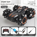 2.4G remote control car, electric stunt car, drifting car, spray function, kids toy car, double-sided stunt car, watch remote control, outdoor RC toy, rechargeable toy car - Black and orange - Size Dual-control