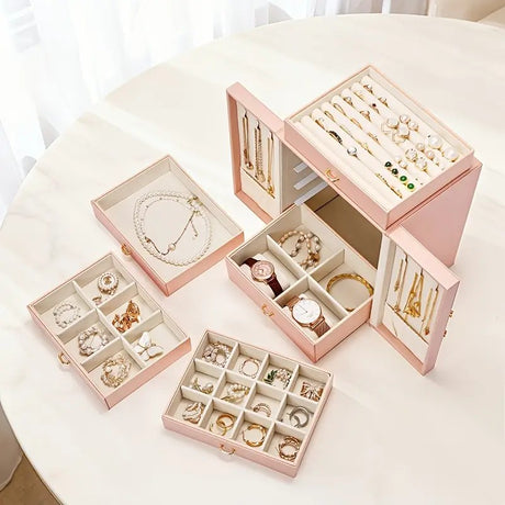 Pink  1 Large Faux Leather Jewelry Storage Box with 5 Drawers and Gold Handles - An elegant rectangular storage space for rings, necklaces, bracelets, earrings, and watches - Features soft fabric lining, side door design, textured surface finish - Luxury