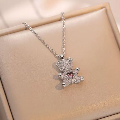 A delicate and adorable pink heart-shaped bear pendant copper necklace, adorned with synthetic zirconia, paired with a stainless steel chain, decorated with synthetic zirconia, perfect as a daily jewelry gift or a sweet and cute party accessory.（gold））