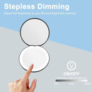 Double-sided makeup mirror with 10x magnifying LED lighting and adjustable brightness. Small, illuminated mirror with adjustable intensity, ideal for handbags. Black.