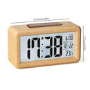 LCD Digital Alarm Clock with Smart Light Sensor, Manual Backlight, Snooze, Battery Operation, Solid Beech