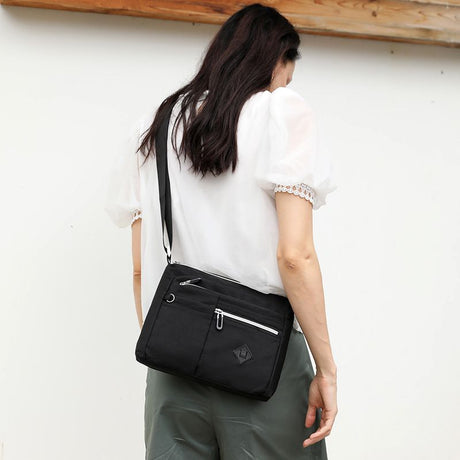 Lightweight Nylon Crossbody Shoulder Bag with Multi Pockets and Adjustable Strap, Light Blue