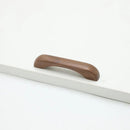 Furniture handles - Kitchen handles - Door handles - Cabinet handles - Drawer knobs - Furniture fittings - Kitchen fittings - Handles - Walnut - Wood - Wooden - Kitchen renovation - Modern - Black walnut - Bridge shape - Pitch 96mm - Walnut - Set of 4