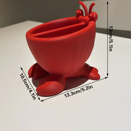 3D-printed crab-shaped toiletries storage box, red.