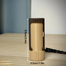 3D-printed compact rotating organizer capsule, 1.3 inches long x 3.4 inches high.