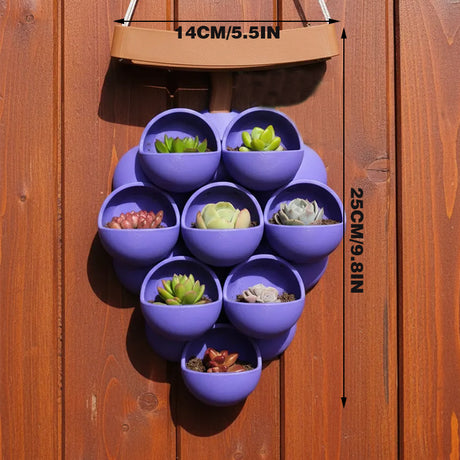 3D-printed grape pots in purple, brown, and green.