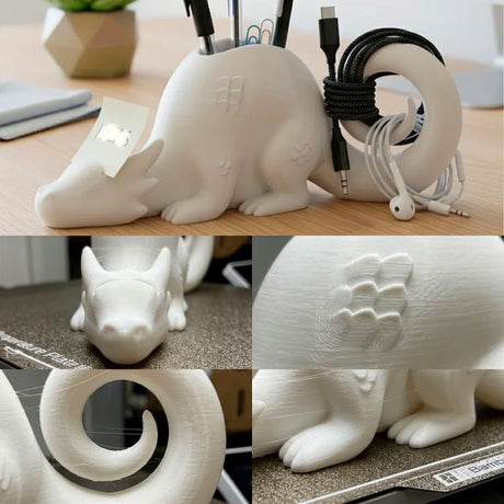 A 3D-printed dragon-shaped desktop organizer adds a touch of fantasy and order to your workspace. (White)