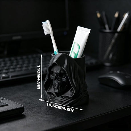 3D-printed hooded skull organizer, perfect for storing toothbrushes and toothpaste in your bathroom. Black.