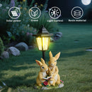 Solar Simulation Rabbit Ornament, charges by day and lights up automatically at night, three rabbits cluster around a street lamp with "WELCOME" bucket, warmly decorates courtyard and balcony, eco-friendly and healing./Rabbit's Kin