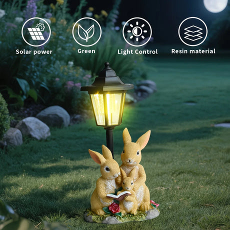 Solar Simulation Rabbit Ornament, charges by day and lights up automatically at night, three rabbits cluster around a street lamp with 