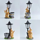 Solar Simulation Rabbit Ornament, charges by day and lights up automatically at night, three rabbits cluster around a street lamp with "WELCOME" bucket, warmly decorates courtyard and balcony, eco-friendly and healing./Rabbit's Kin