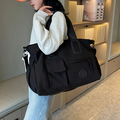 brown Large-capacity travel tote bag, lightweight carry-on luggage with shoulder strap, gym bag, portable laptop bag, ideal for short trips, hand-carry style.