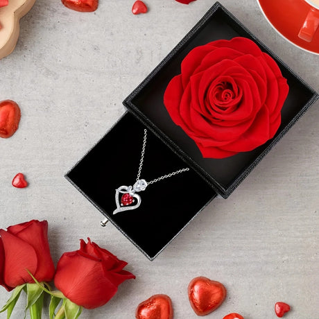 Rose Heart Pendant Necklace, copper-inlaid zirconia with ruby accents, adjustable chain. Symbolizing 