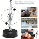 Newton's Cradle, an artistic craft piece for both home and office – a perpetual motion desktop ornament (requires 4 AA batteries to operate / batteries not included).