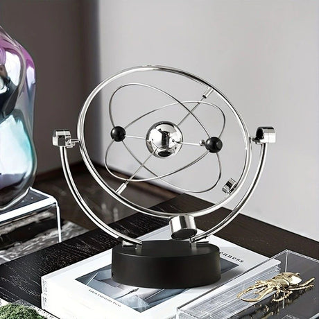 Newton's Cradle, an artistic craft piece for both home and office – a perpetual motion desktop ornament (requires 4 AA batteries to operate / batteries not included).