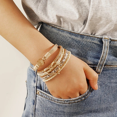 Bohemian Braided Leather Bracelet, Multi-layer Design with Metal and Crystal Accents, Rose Gold Square Clasp with Heart Crystal, Embodying Casual Romantic Exotic Charm.(brown)