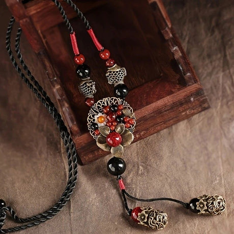 Bohemian style long necklace featuring retro beads and metal carved flowers with elegant dangling tassels adjustable 86cm chain suitable for pairing with sweaters and dresses perfect for daily wear or holiday occasions