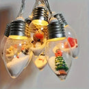 Christmas Wish Bulb String Light | 10 LED Warm Light Mini Scenes, Battery-Powered (Batteries Not Included), 150cm Long, Embedded Santa Claus, Snowman & Reindeer Designs, Hang Anywhere to Brighten Up the Holidays