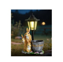 Solar Simulation Rabbit Ornament, charges by day and lights up automatically at night, three rabbits cluster around a street lamp with "WELCOME" bucket, warmly decorates courtyard and balcony, eco-friendly and healing./Resin flowerpot rabbit
