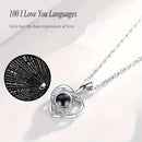 A Hundred Languages Heart-Shaped Projection Necklace Set, silver-plated with zirconia inlay, paired with an apple preserved rose gift box—a perfect fusion of technology and romance.