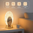 Rechargeable acrylic crystal desk lamp with 3 color temperatures touch control, USB charging for portability, and stepless brightness adjustment. Diamond-cut design serves as both an ambient light and an art piece./Peacock feather