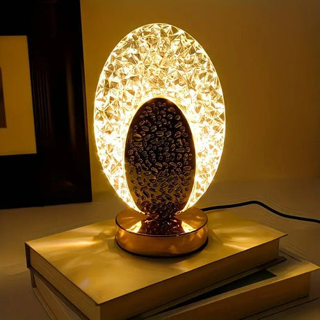 Rechargeable acrylic crystal desk lamp with 3 color temperatures touch control, USB charging for portability, and stepless brightness adjustment. Diamond-cut design serves as both an ambient light and an art piece./Peacock feather