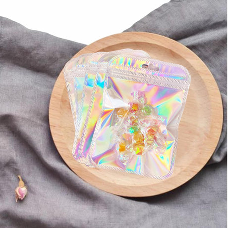 100 Pcs Holographic Resealable Packaging Bags for Small Business Supplies, Cute Small Color Smell Proof Bags Plastic Baggies for Lip Gloss Soap Party Food Storage 4x6inch