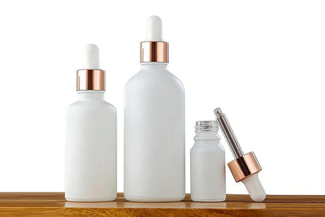 10 Pack Glass Dropper Bottles Rose Gold Caps for Essential Oils - 50ml