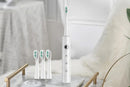 Electric Toothbrush for Adults Powerful Sonic Toothbrush 6 Modes with 4 Replacement Brush Heads - White