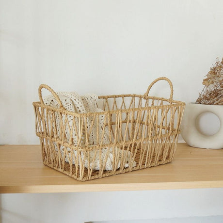 Handwoven paper rope storage basket with a rectangular design and two handles; perfect for organizing desk clutter, snacks, and cosmetics; Bohemian-style storage basket