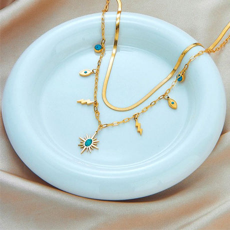 Double-layered bohemian-style necklace, 18K gold-plated titanium choker with eye and lightning bolt pendants