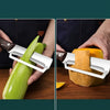 Heavy-duty stainless steel vegetable peeler and slicer - multi-functional kitchen tool with straight blade and ergonomic non-slip handle.