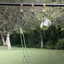 Long, sturdy, and heat-resistant charcoal tongs for grilling food. Made of stainless steel, these portable tongs are suitable for outdoor grilling, charcoal, and fire pits.