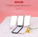 2-Piece Pink Portable LED Makeup Mirror with Brush - Foldable, Rotatable, and Rechargeable Travel Vanity Mirror