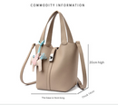 Beige Women's Small PU Leather Bucket Bag with Secure Lock and Horse Charm - 20cm Compact Crossbody Handbag for Everyday Use