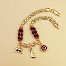 Gold-Tone Chain Bracelet with Red and Black Beads, Elephant Charm, Feather Pendant, and Round Stone Accent – 19 cm Length