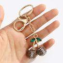 2 Pcs Brown rugby ball shape Creative Sports Ball Cherry Keychain – Cute Resin Charm for Car Keys, Bags & Backpacks