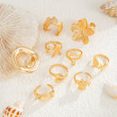 9-Piece Pale Gold Ocean-Inspired Stackable Ring Set - Metal Sea Turtle Starfish Floral Adjustable Open Finger Jewelry for Women
