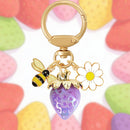 Solid Purple Strawberry Bee Daisy Keychain - Gold Metal Ring with Rhinestone Fruit Charm, Cute Bag Accessory for Women and Girls