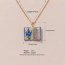 Vintage-style book necklace with July birthday flowers, a luxurious gold-plated bronze exquisite floral pendant gift