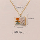 Vintage-style book necklace with October birthday flowers, a luxurious gold-plated bronze exquisite floral pendant gift