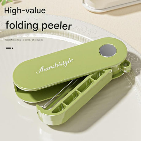 Green Portable Folding Fruit Peeler - Stainless Steel Blade, ABS and PP Handle - Compact 9cm Design, Travel Friendly Kitchen Tool for Camping and Home Use