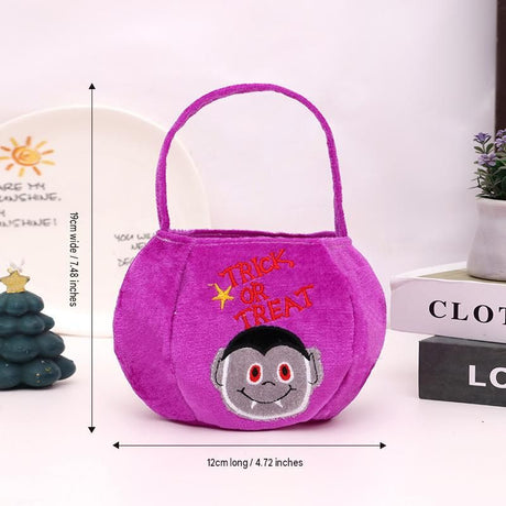 Purple bag with a vampire design - Plush Halloween Trick or Treat Candy Bag - Polyester  Tote with Embroidered Face, Lightweight Portable Goody Pouch for  Party Favors and Trick or Treating
