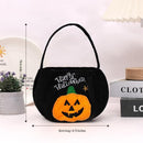 Black bag with a pumpkin pattern - Plush Halloween Trick or Treat Candy Bag - Polyester  Tote with Embroidered Face, Lightweight Portable Goody Pouch for  Party Favors and Trick or Treating