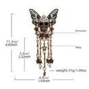 Gothic Skull Butterfly Brooch with Tassel - Vintage Rhinestone Skeleton Pin with Dangling Charms, Dark Aesthetic Statement Badge for Coat Sweater, 11.3cm